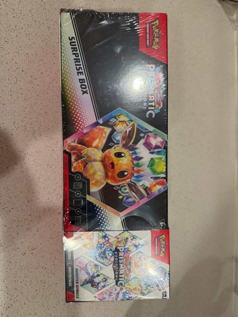 Pokemon Prismatic Evolutions Surprise Box - Black, Rainbow